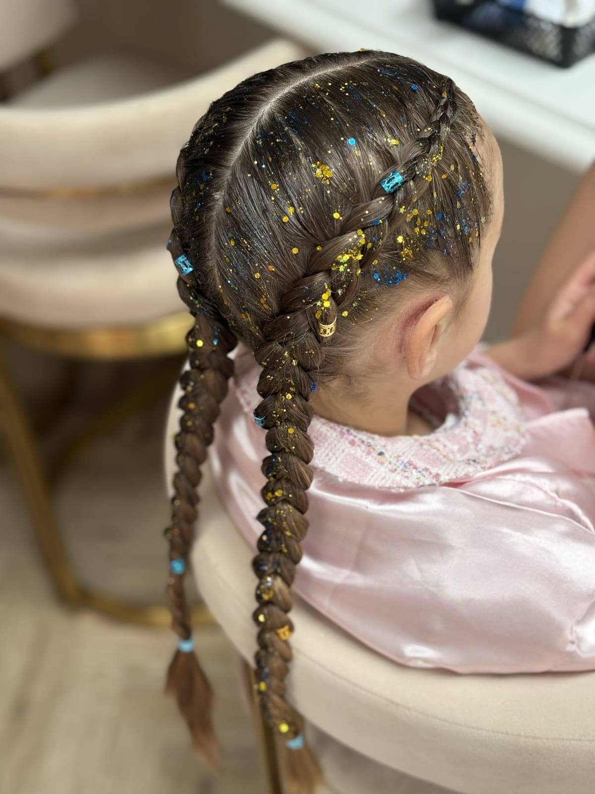 Party braids with gold glitter